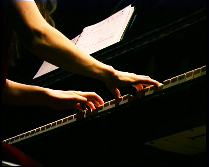 Hands on piano